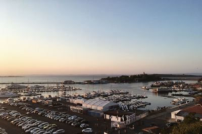 High angle view of city at sunset