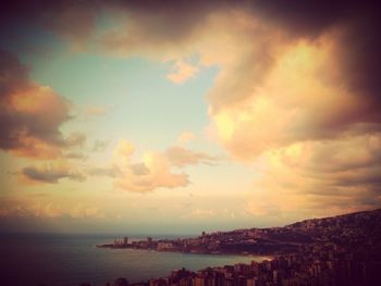 Scenic view of sea against cloudy sky