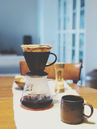 Close-up of coffee cup on table
