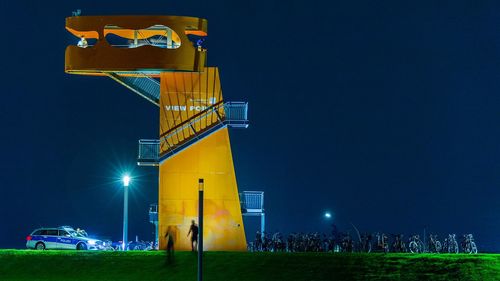Low angle view of illuminated built structure