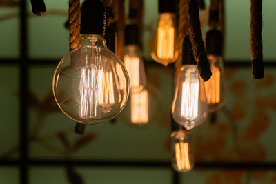 Close-up of illuminated light bulb