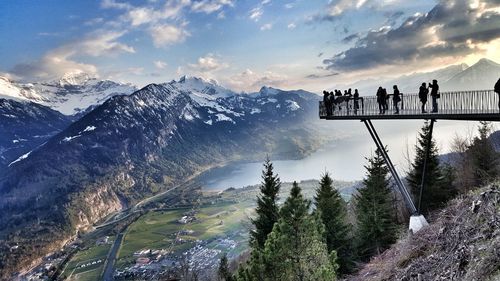 People overlooking rocky landscape