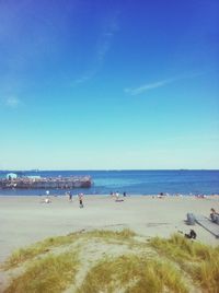 Scenic view of sea against blue sky