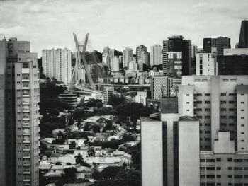 Modern buildings in city against sky