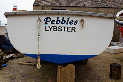 Close-up of information sign on boat