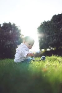 Cute boy in grass