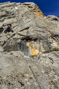 High angle view of ropes on rock