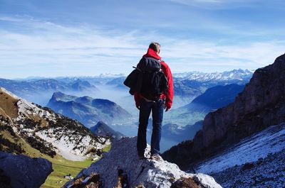 Woman standing on mountain