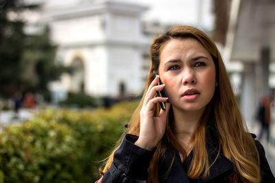 Woman talking on smart phone