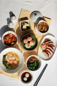 High angle view of food on table by chinese food set menu