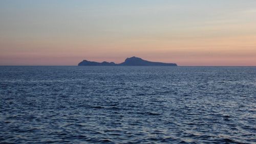 Scenic view of sea at sunset