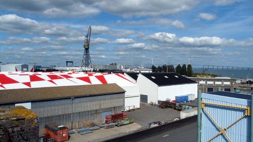 High angle view of buildings in city against sky