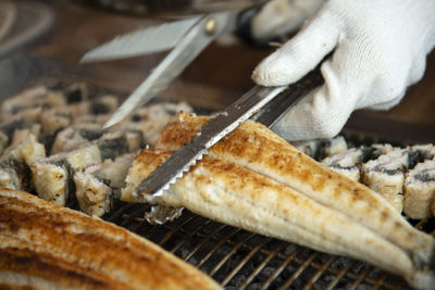 Close-up of meat on barbecue grill