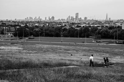 Panoramic view of city buildings against sky