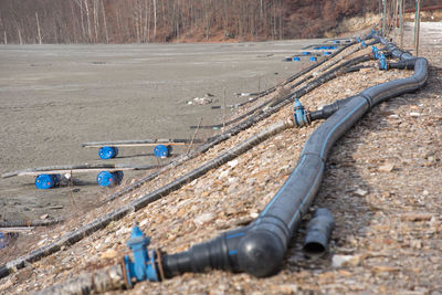 Decanting lake pipe installation treatment with lime for purification of water of heavy metals