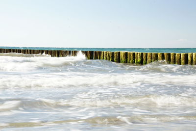 Scenic view of sea against clear sky