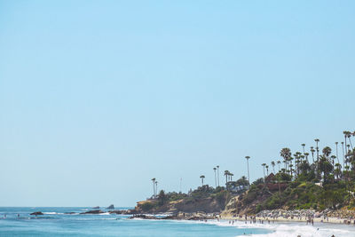 Scenic view of sea against clear blue sky