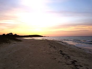 Scenic view of beach during sunset