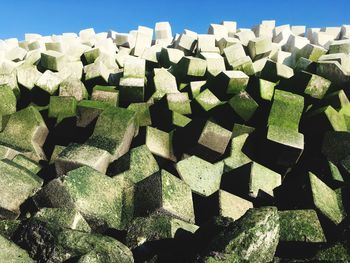 Close up of pile of stone blocks on sunny day