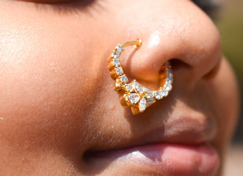 Close-up portrait of girl wearing nose ring