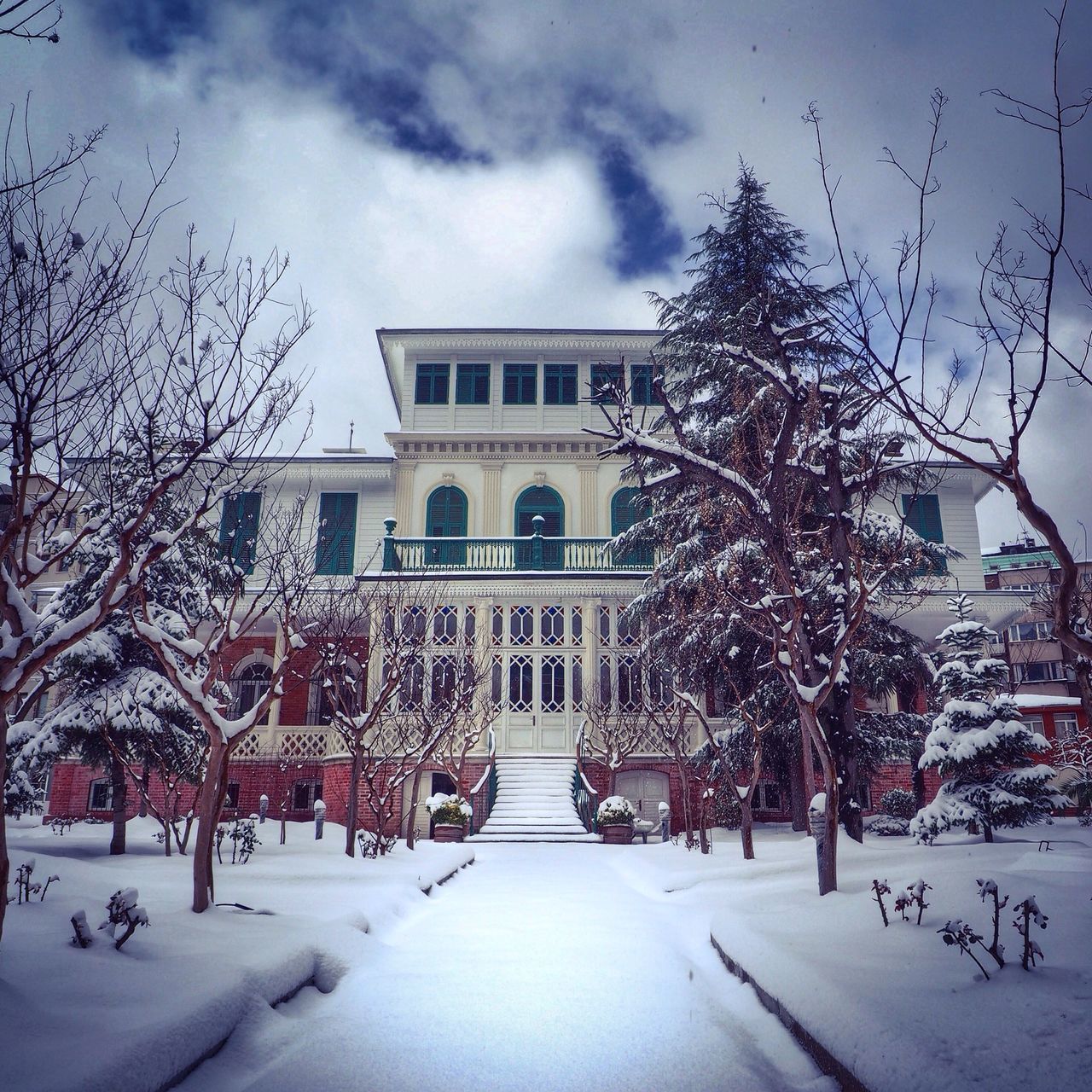 snow, winter, cold temperature, building exterior, architecture, built structure, season, tree, weather, bare tree, sky, covering, house, street, cloud - sky, nature, road, city, residential building, outdoors