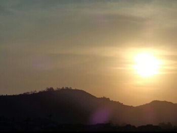 Scenic view of mountains at sunset