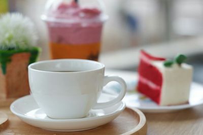 Close-up of coffee cup on table