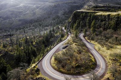 High angle view of road amidst mountains