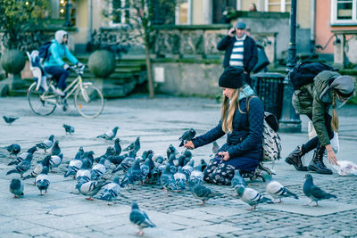 People on zebra crossing in city