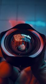 Close-up of hand holding camera