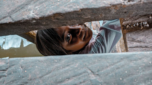 Close-up portrait of woman wearing hat