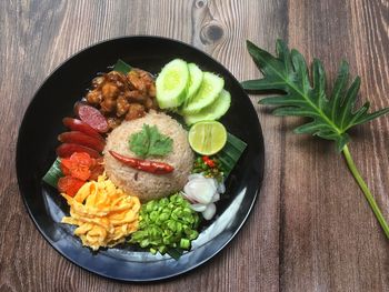 High angle view of salad in bowl on table