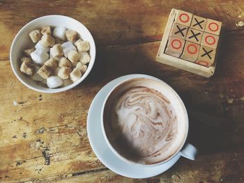 Close-up of coffee cup on table