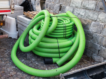 High angle view of green pipes on wall