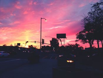 Car on road at sunset