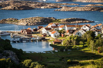 Scenic view of town against cloudy sky