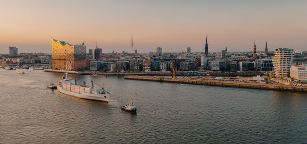 View of buildings at waterfront in hamburg germany 
