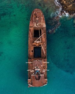 High angle view of abandoned boat moored in sea