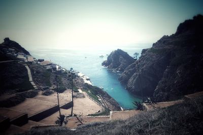 Panoramic view of beach against clear sky