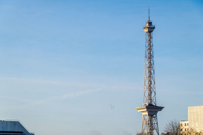 Low angle view of television tower against sky