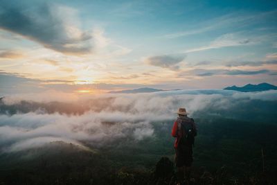 Scenic view of landscape against cloudy sky