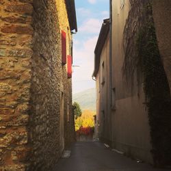 Narrow alley along buildings