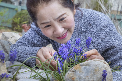 Portrait of smiling young woman outdoors