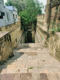 Alley amidst buildings in city