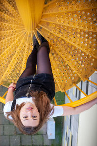 Portrait of happy girl playing outdoors