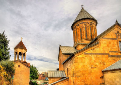 Low angle view of traditional building against sky