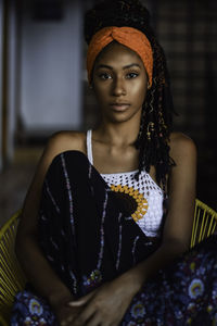 Interior portrait of young latin woman