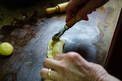 Close-up of man working on table