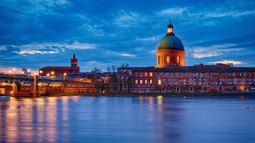 View of illuminated city at waterfront
