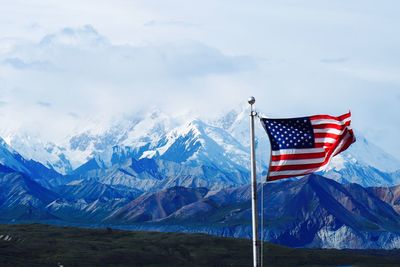 Scenic view of mountain range against sky